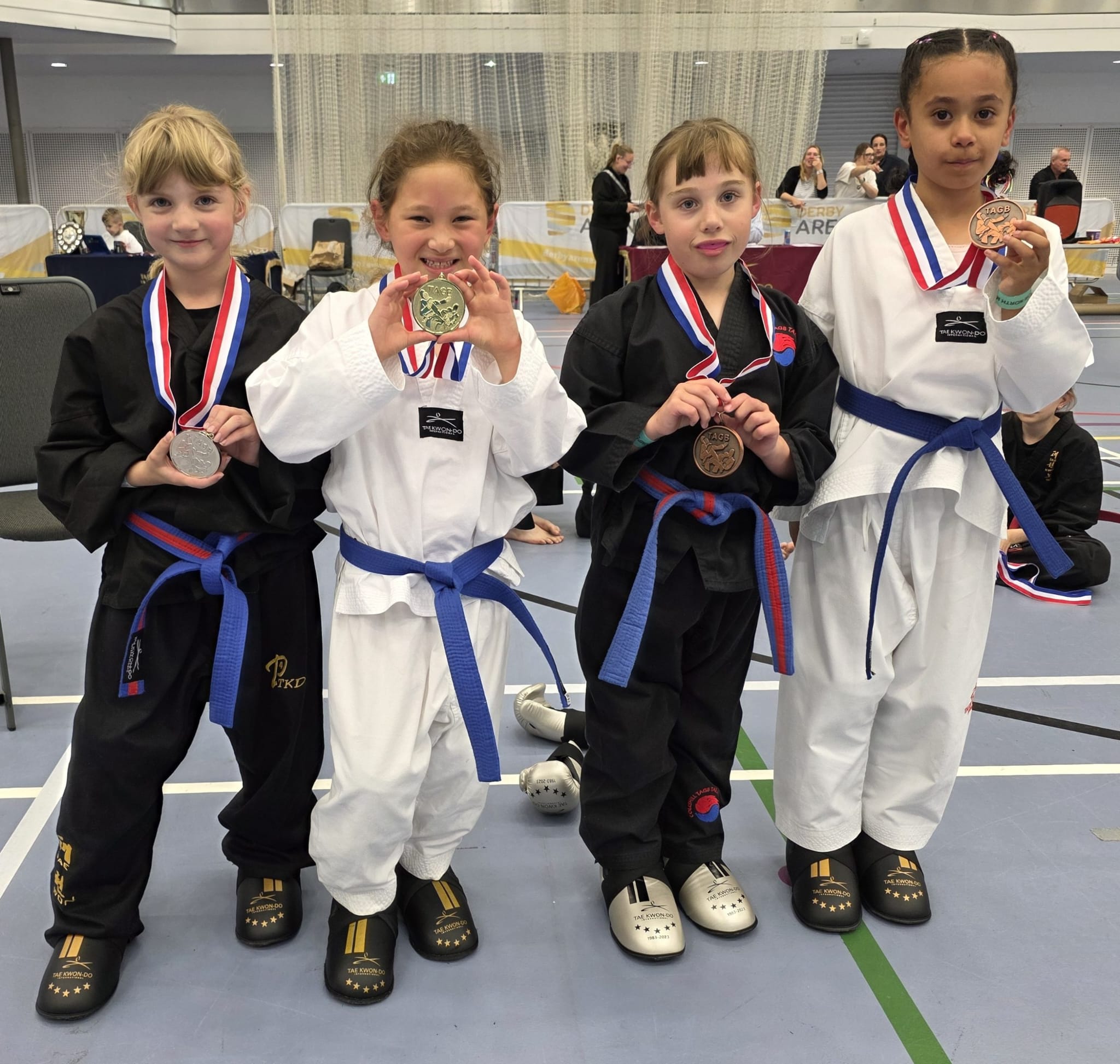 Aurora with fellow young TAGB competitors and their medals