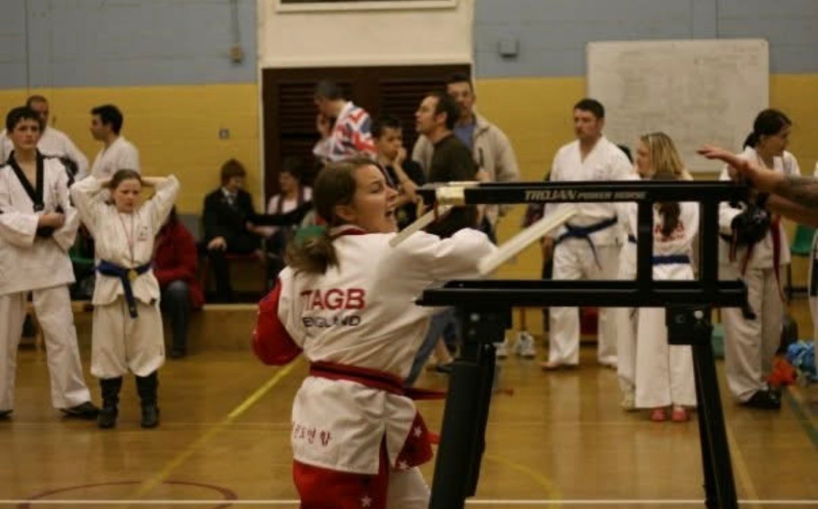 Ellen Simmons board breaking at competition
