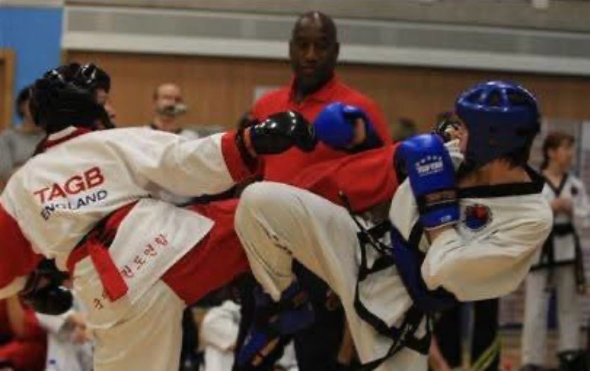 Ellen taking part in a Taekwondo sparring match