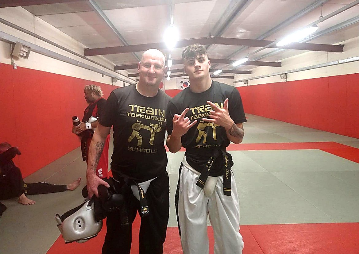 Gavin Cook competing in Taekwondo