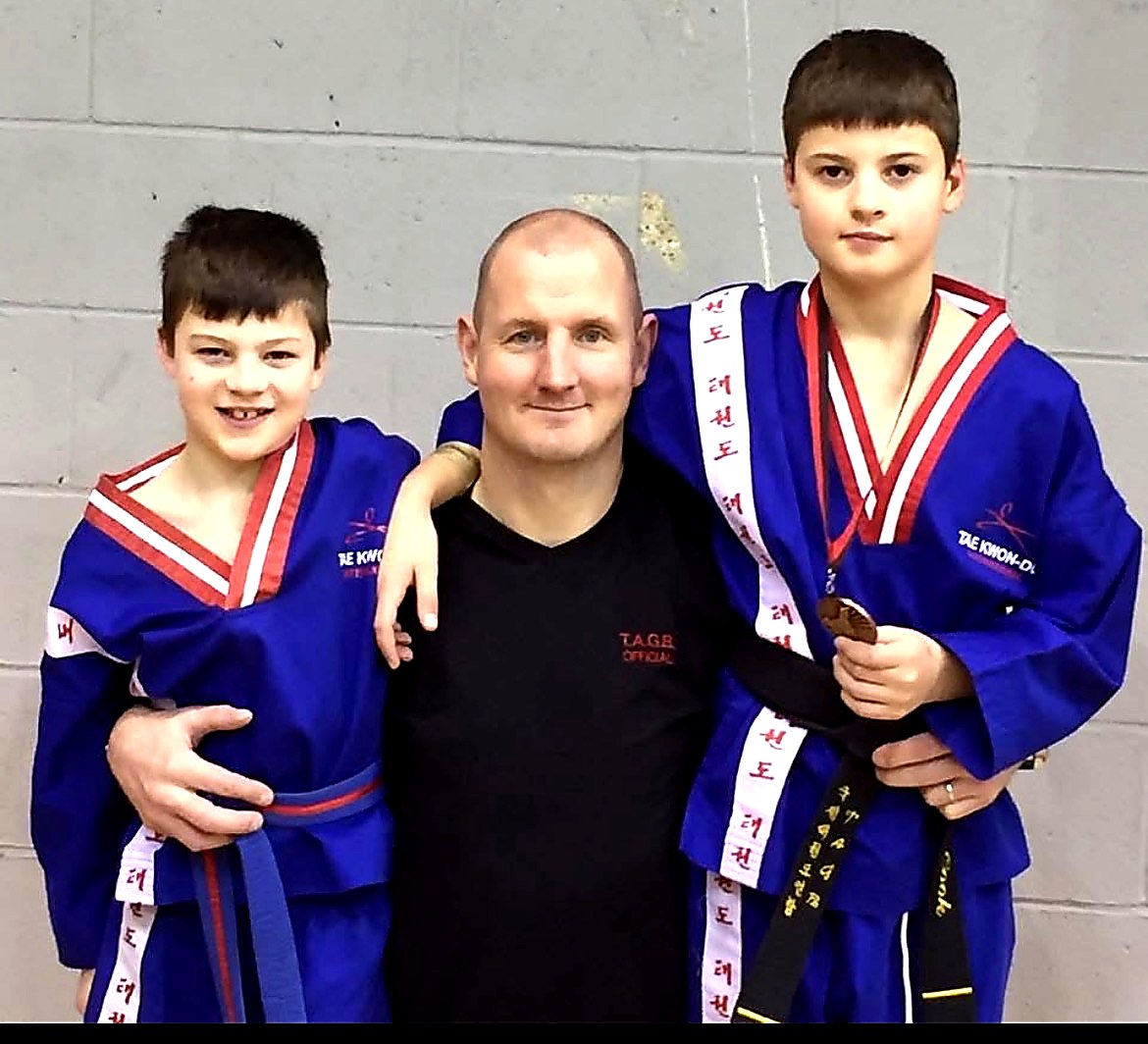 Gavin Cook competing in Taekwondo