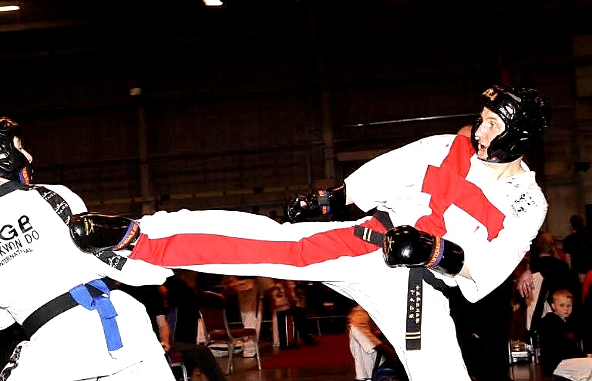 Gavin Cook competing in Taekwondo