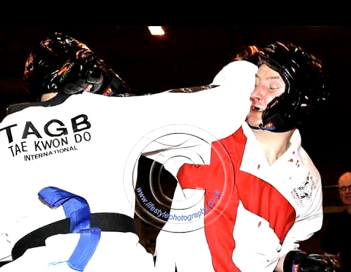 Gavin Cook competing in Taekwondo