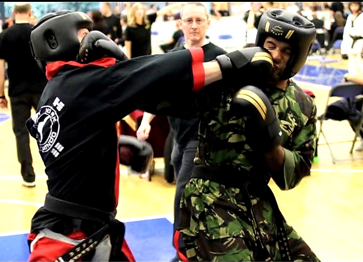 Gavin Cook competing in Taekwondo