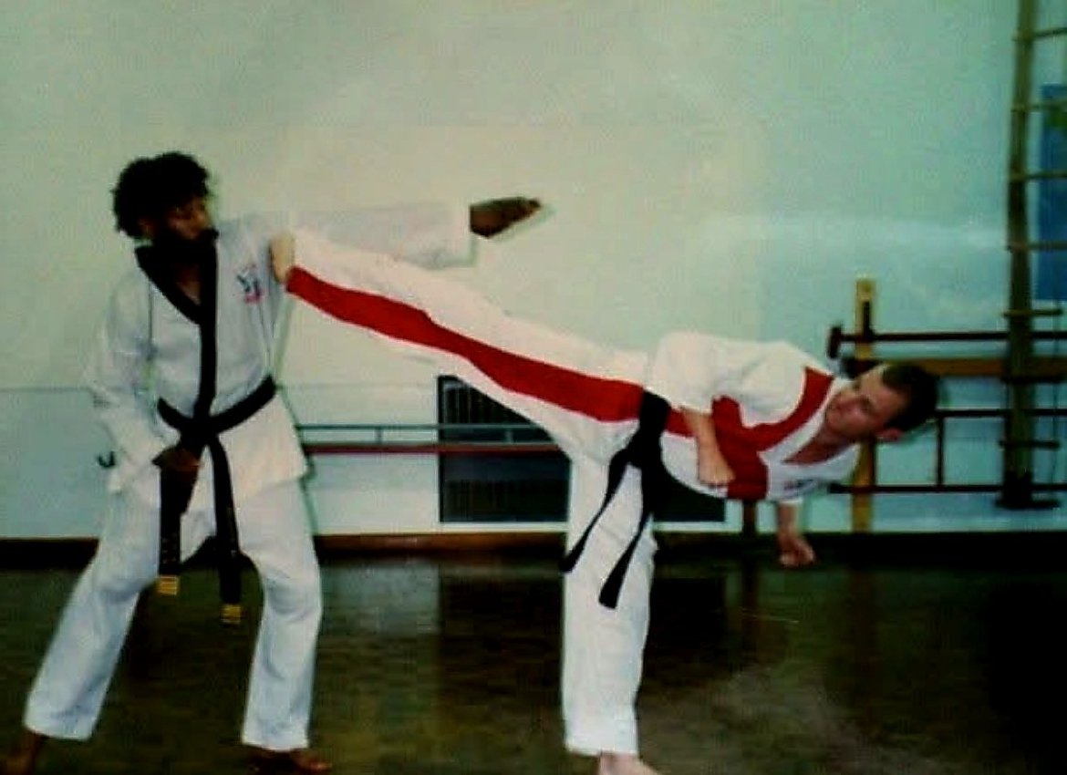 Gavin Cook competing in Taekwondo