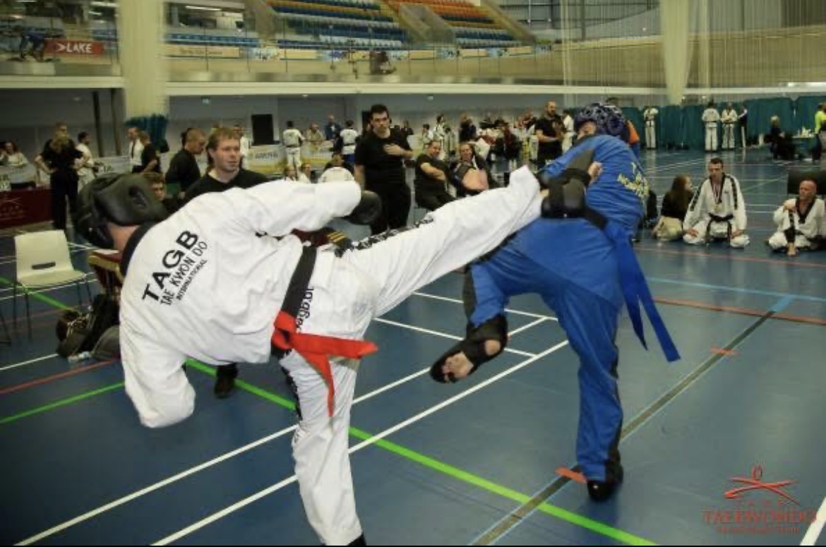 Gavin Cook competing in Taekwondo sparring