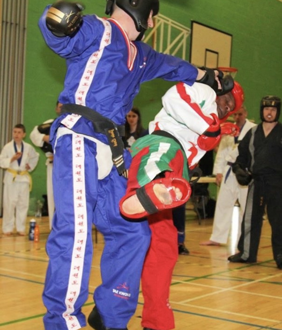 Gavin Cook competing in Taekwondo sparring