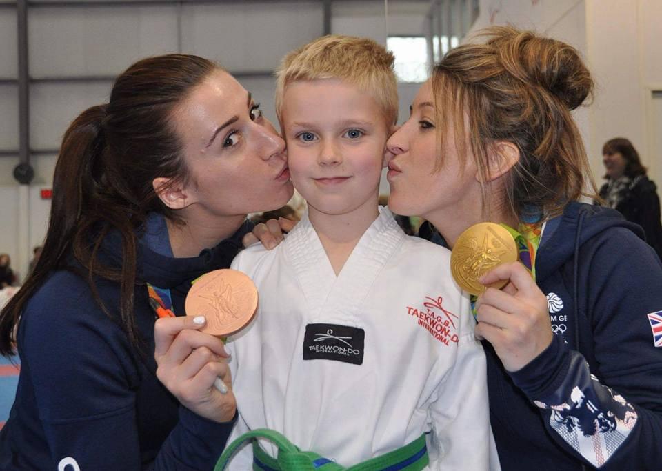 Young Jake with GB Olympic medallists and their Rio medals