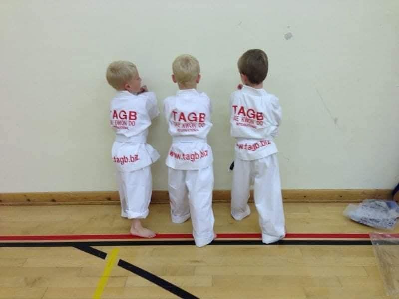 Jake (left) as a tiny tot with two friends in TAGB doboks