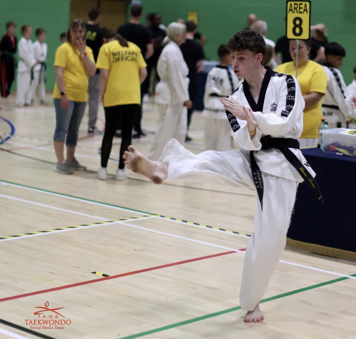 Lucas Foster executing a kick during a TAGB pattern competition