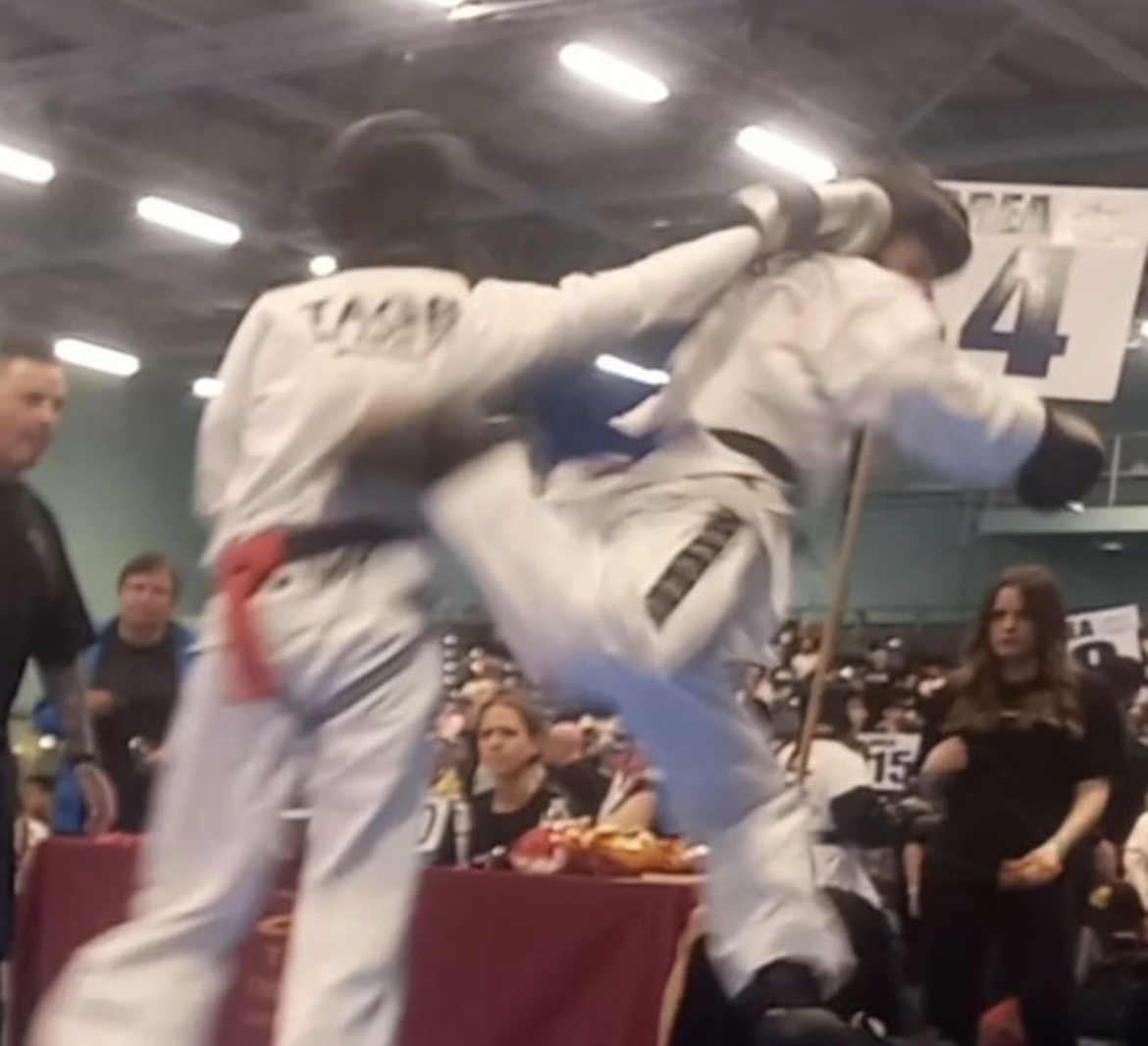 Lucas Foster in a close sparring exchange at a TAGB competition